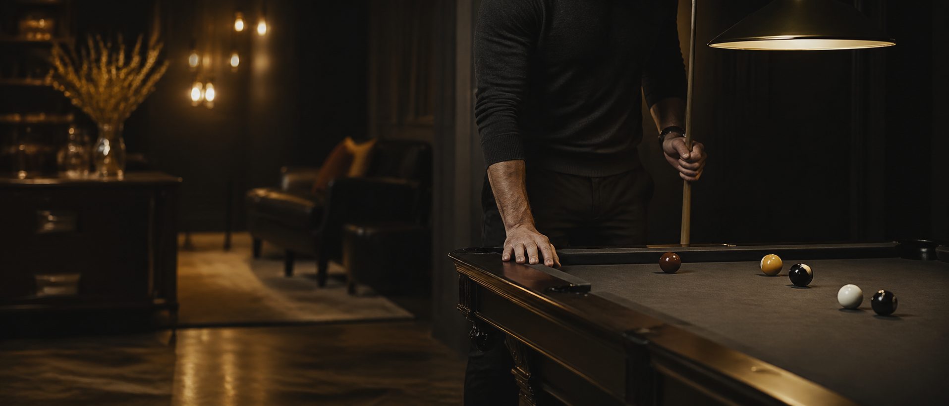 premium slate pool table in refined man cave under pendant lighting in a high-end lounge, KingsCave brand imagery